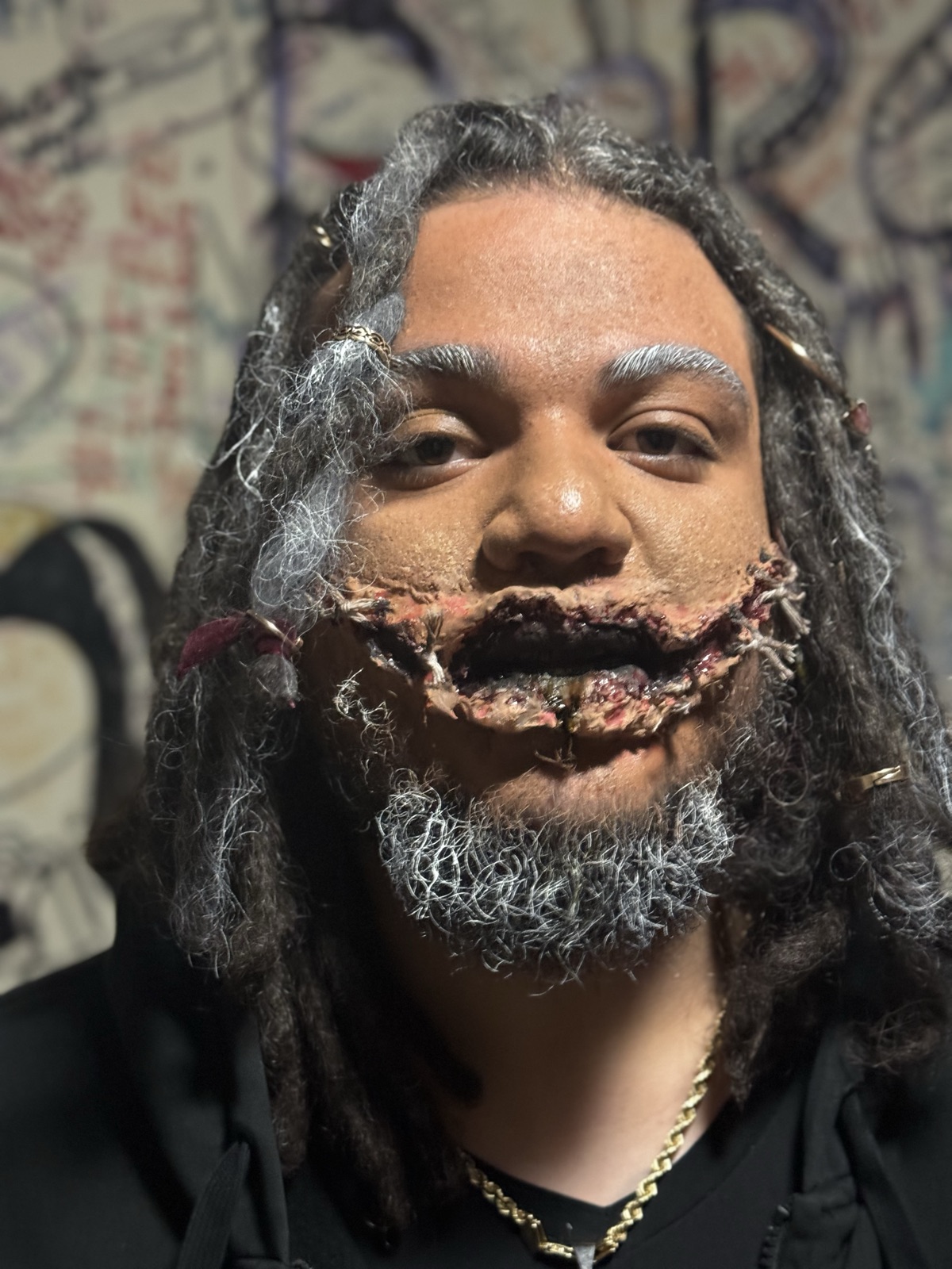 Finished fictional stitched-mouth character makeup for a JGI Media film production